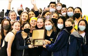 The team holds the trophy for winning the district title. Courtesy Photo