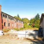 Barracks, left, and stables, right, as they are now. Courtesy Photo