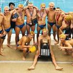 The Bainbridge water polo team gathers around the state championship trophy. Courtesy Photo