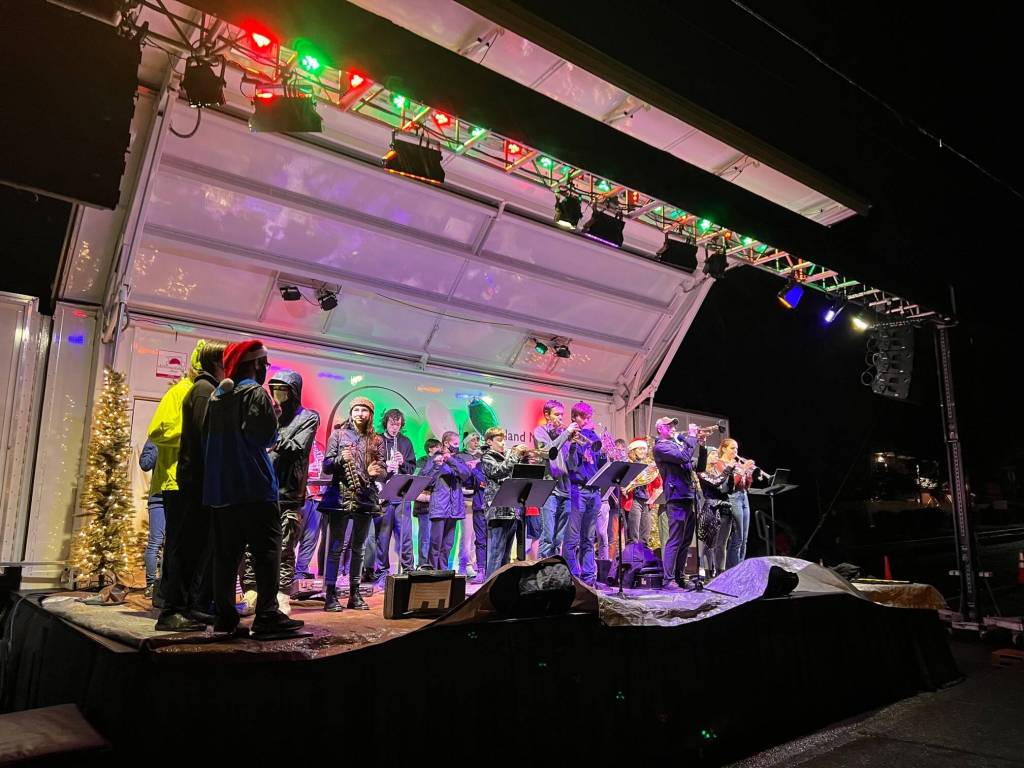 Bainbridge High School band students play Christmas songs and holiday music at Winslow Green during the Annual Christmas Tree Lighting.