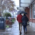 Visitors walking along Winslow Way.
