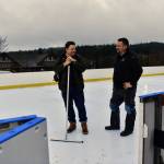 Pleasant Beach Village general manager Joe Raymond and Josh Sluys, director of facilities, making the final checks on the new skating rink before it opened to the public Nov. 26. The new facility is a synthetic ice skating rink that will be open through the winter months.