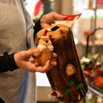 Katia Buskrik, owner of Z Bones Pet Merchantile in Winslow, holds an example of the toys customers are buying for their pets this year.