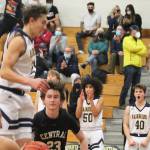 The BI bench cheers after a teammate blocks a shot.