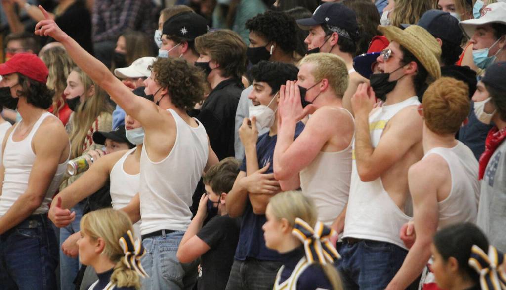 Fans in the BI student section react after the Spartans blocked a shot.