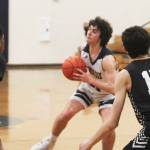 BIs Henry Carsten (20) gets ready to shoot the ball against CK.
