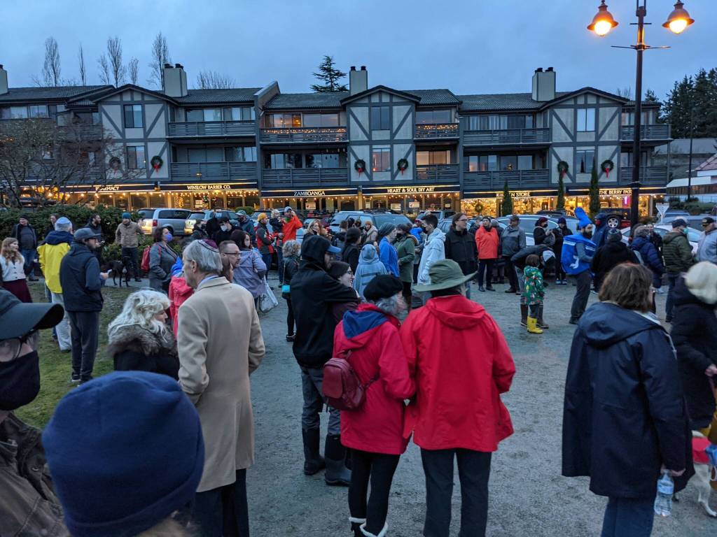 More than 250 attendees gathered to celebrate the fourth annual lighting of the 9-foot-tall community Menorah that was on display at Winslow Green. Photo courtesy of Rabbi Mendi Goldshmid.