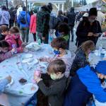 Children decorate cookies and make crafts during the Hanukkah celebration at Winslow Green.