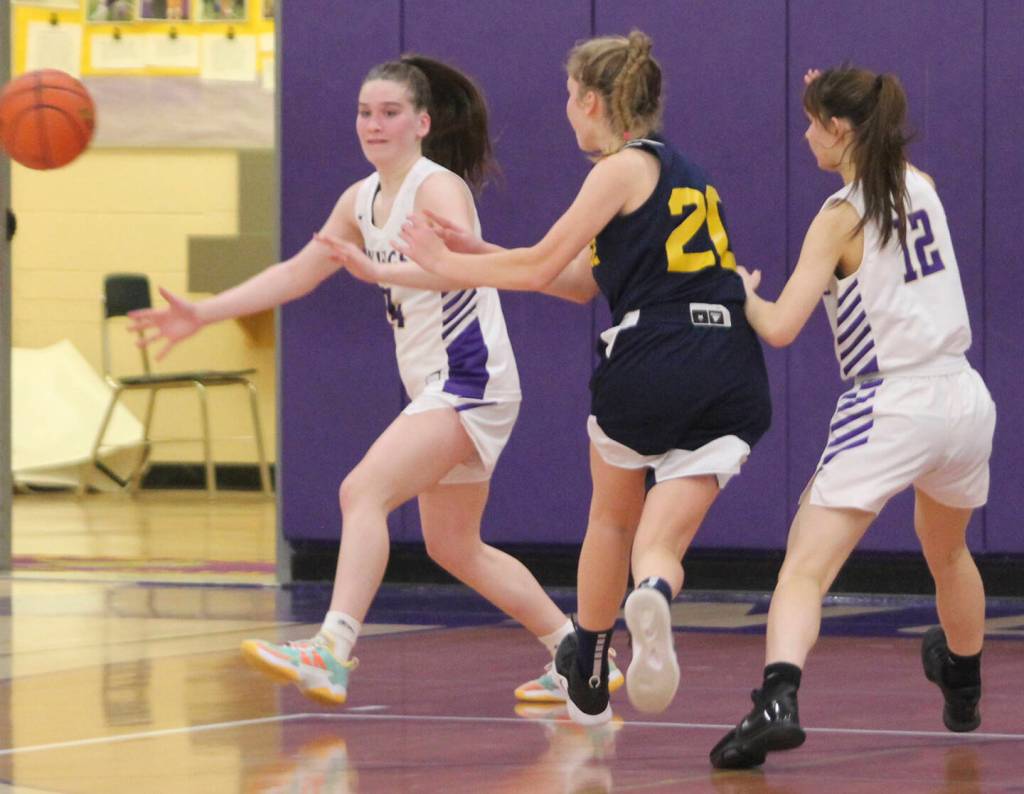Grace Colburn (20) of Bainbridge passes the ball off to a teammate.