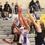 Evelyn Beers of North Kitsap puts up a shot against Bainbridges Ghadir Ramadan.