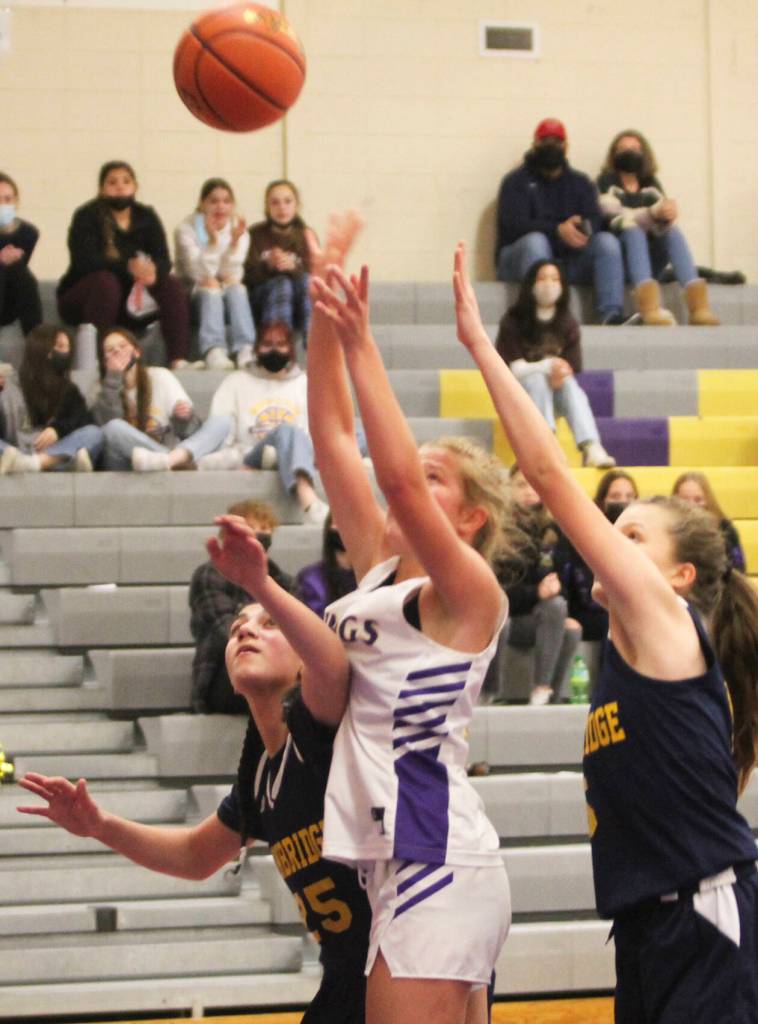 Evelyn Beers of North Kitsap puts up a shot against Bainbridges Ghadir Ramadan.