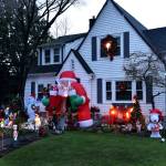Santa greets visitors at the front door.