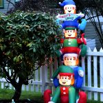 Elves playing in Jackie West's yard on Ferncliff Avenue.