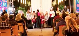 A number of singers perform at the concert.