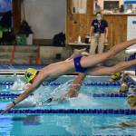 Bainbridge Island High School and North Kitsap High School dive in for the 200 yard individual medley at the BI Aquatic Center Dec. 16. Nancy Treder/Bainbridge Island Review photos