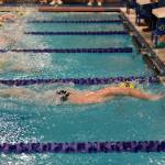 A BHS swimmer finishes almost one length ahead of the competition when BHS and NKHS met at the Aquatic Center.