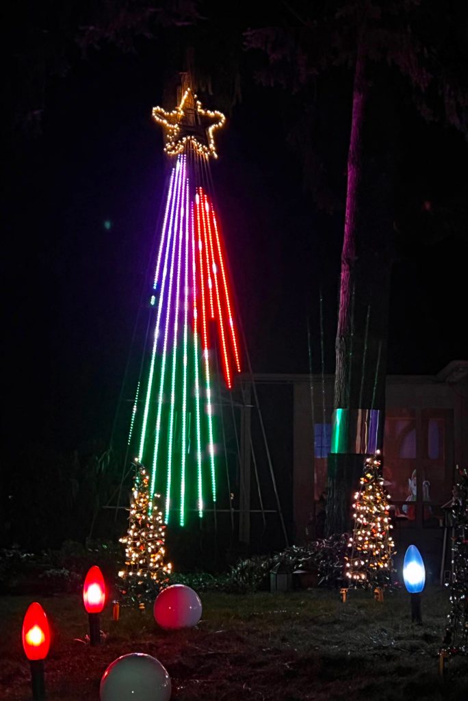 This tall LED Christmas tree is the largest feature in Jeff and Tammy Kesler's annual lighting display that he has been setting up at their Commodore home each year since 2002.  Kesler said it takes about a week to set out the 60 strands of lights and an array of items to complete the multi-media experience that includes a video of Santa's workshop and radio broadcast songs that play in sync with the LED lighting displays. This year, Kesler worked about 15 hours to program a new version of The Macarena. The holiday lighting display will light up the night until New Year's Day and runs from 4:30-10 p.m.