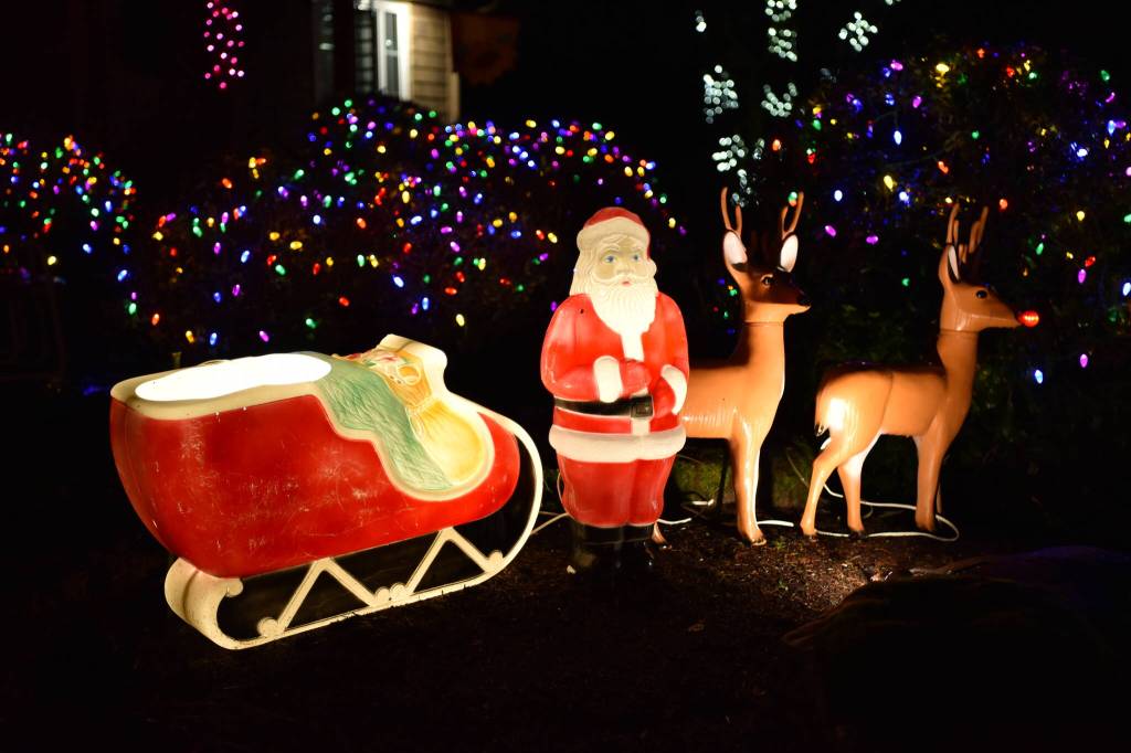 Santa's sleigh and his reindeer in Rolling Bay.