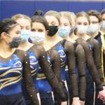 The Bainbridge High School gymnastics team lines up in the ceremony to start the meet.