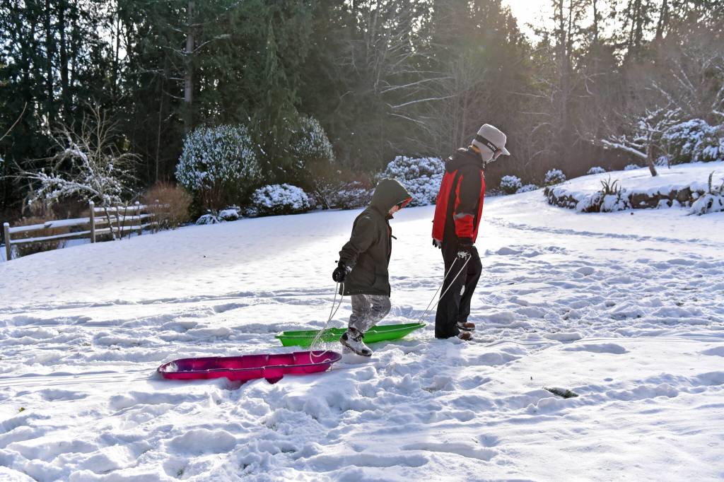 Cousins debate about who made the best time down the hill.