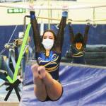 Sofia Fleischmann of Bainbridge competes in the uneven bars against Port Angeles.