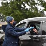 BISD COVID testing coordinator April Murray administers the 200th rapid test on the morning of Jan. 10.