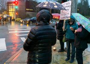 Locals protest the Capitol insurrection at the intersection near the ferry docks on Bainbridge Island. Courtesy photo
