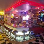 Neon lights and signs gives My Girl a 1950s feel, along with all the other collectibles from that time period.