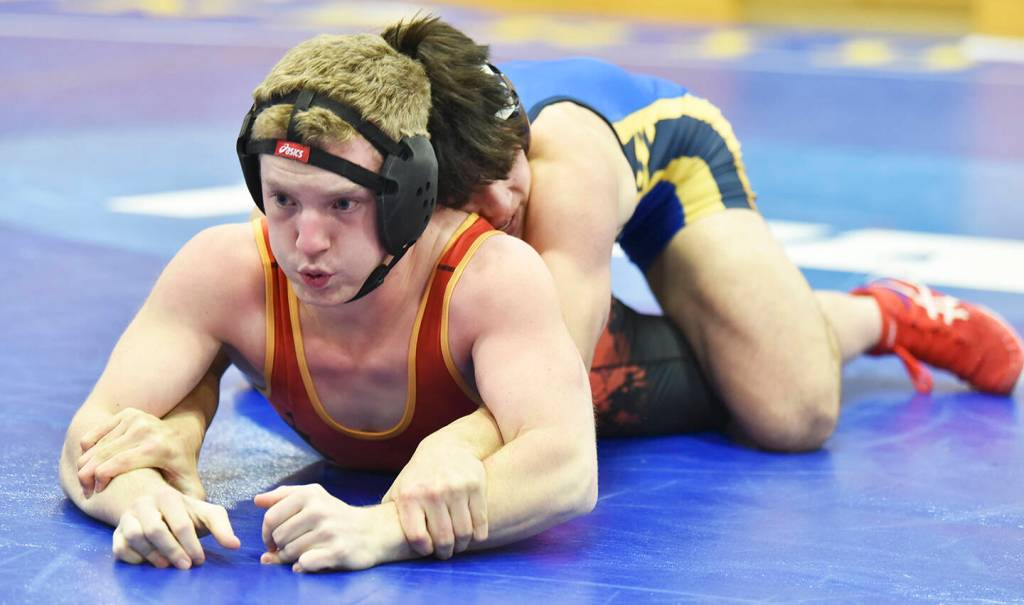 Spartan Quentin Ikuse pinned Kingstons Joseph Jafte in 1:47.