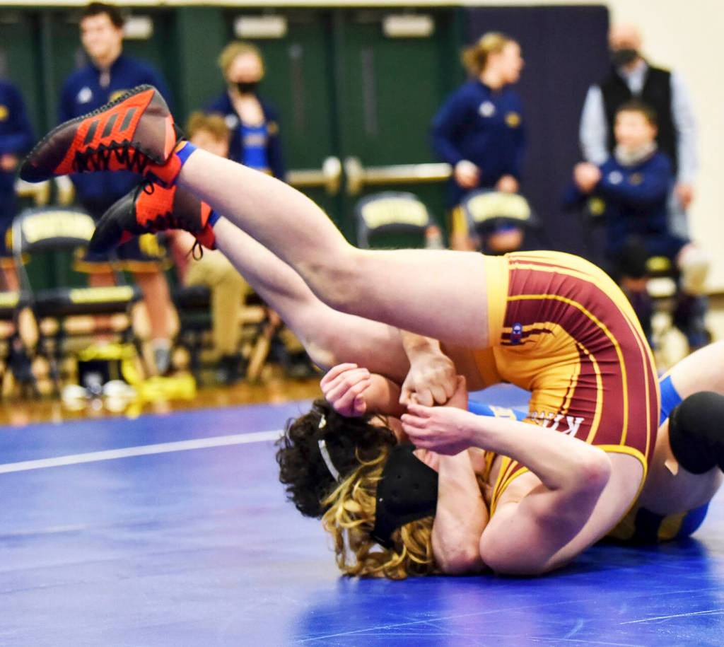 Garrett Goade of Bainbridge pins Liam Nickerson of Kingston.