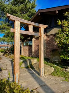 A new tori welcomes visitors to the garden at the Bainbridge Island Public Library. Nancy Treder/Bainbridge Island Review photos