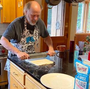 Bill Baran-Mickle rolling out the dough. Courtesy photos