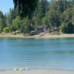 Beach lovers enjoy scenic Little Manzanita Bay. Courtesy Photos