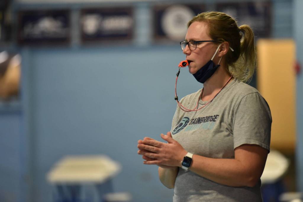 Coach Kristin Gellert watches a scrimmage.