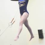 Avery Gray of Bainbridge competes on the balance beam. Steve Powell/File Photos