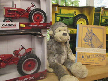 The store sells toys, with a focus on farm ones like tractors.