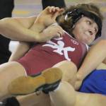 Monica Kaiser turns the tables to pin Aubrie Aukland of Bainbridge.