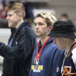 Oskar Bannister of Bainbridge Island with his medal on the awards stand. Steve Powell/Bainbridge Island Review photos
