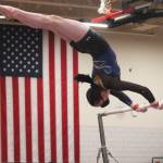 Steve Powell/Bainbridge Island Review photos
Above: Jade Bereman smiles and gives teammate Avery Gray a hug after her performance on the bars. At left: Freshman Grace Reeb of Bainbridge competes in the uneven bars at state. See page A10 for the full story.
Freshman Grace Reeb of Bainbridge competes in the uneven bars at state.