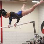 Freshman Jade Bereman of Bainbridge swings around the high bar at the state gymnastics meet last week.
Freshman Jade Bereman of Bainbridge swings around the high bar at the state gymnastics meet last week. Steve Powell/Bainbridge Island Review photos