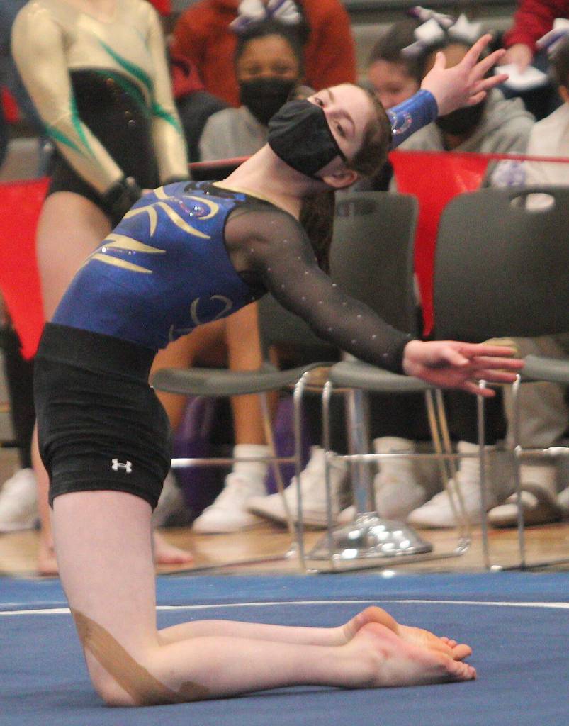 Grace Reeb dances her routine to music in the floor exercise at state.