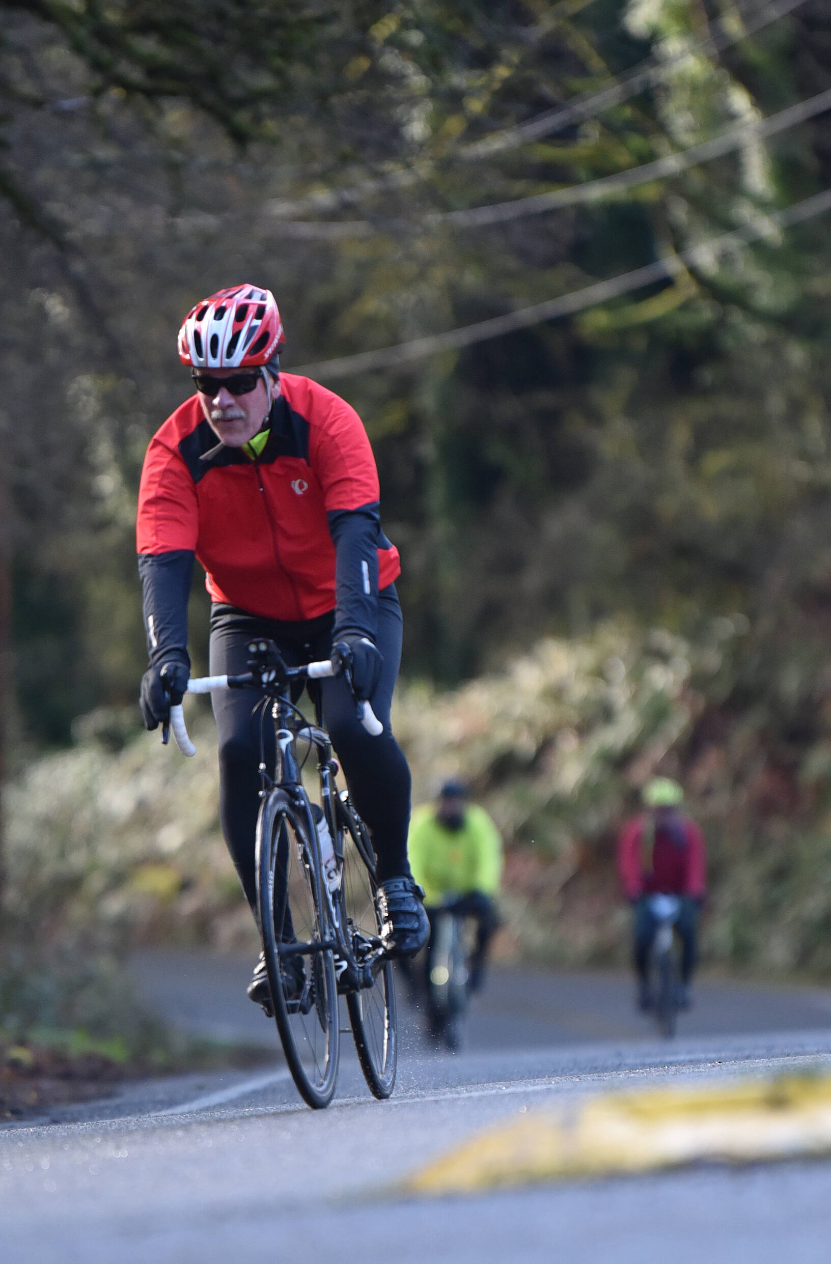 Riders near the corner of Moran Road NE and N. Madison Ave.
