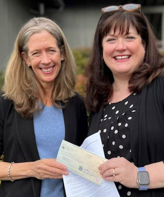 Carol Perry, left, along with Debbie Kuffel of Bainbridge Community Foundation.
