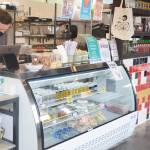 Customers can order food from the restaurant or the display case at the front counter.