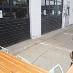 Dont be fooled by the garage doors. They open up to add more restaurant seating to this outside dining area.