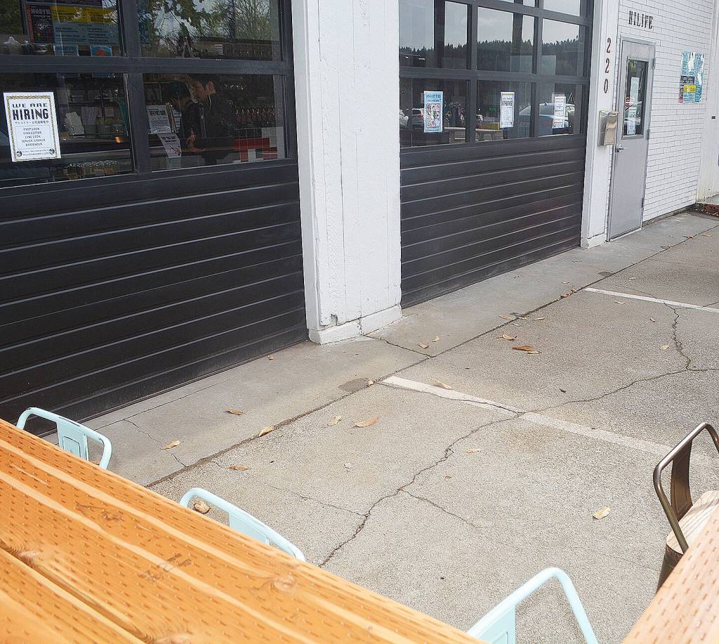 Dont be fooled by the garage doors. They open up to add more restaurant seating to this outside dining area.