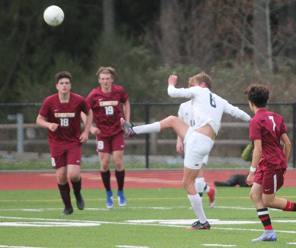 Calvin Moe (6) of BHS follows through after a kick against Kingston.