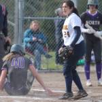 Laura Carillo covers home for BI, but North Kitsap scored anyway.