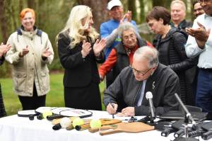 Gov. Jay Inslee signs a bill making pickleball the official state sport. Nancy Treder/Bainbridge Review photos