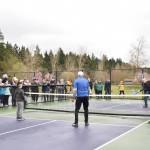 Gov. Jay Inslee participates in an exhibition pickleball game at Battle Point Park.